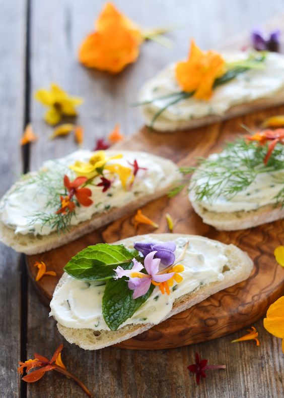 cream cheese and chive sandwiches with edible flowers for a romantic feel