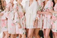 13 a short bridal robe with lace trim and pink floral print bridesmaids’ robes