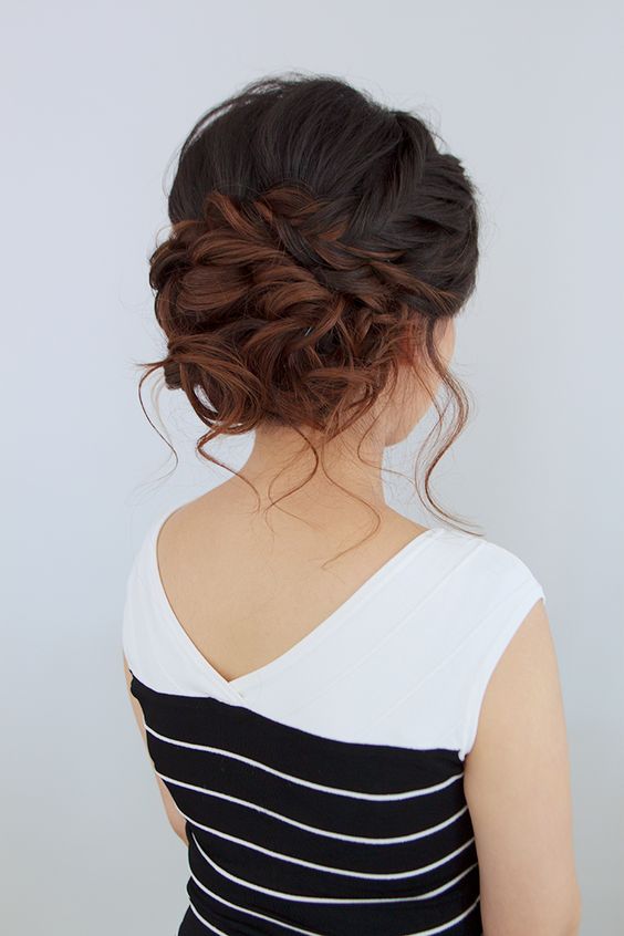braided and wavy updo with some locks down looks amazing with ombre hair