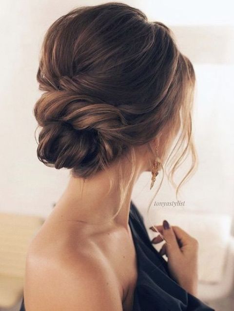 a low twisted bun and locks down is suitable for short and medium hair