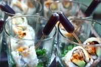 14 sushi with soy sauce pipettes is a creative serving idea