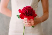 15 a single red bloom to stand out with a neutral wedding gown