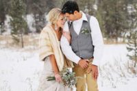 15 tan pants, a grey vest, a white shirt and boots for a relaxed winter groom’s look