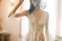 17 a chic off-white lace long bridal robe  with half sleeves, a lace bodice and a lace trim is a stunning idea for a morning or a boudoir