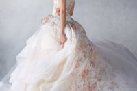 19 a sleeveless floral print wedding dress with a layered ruffled skirt and a train