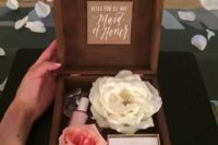 21 a chic box with fresh blooms, a necklace and pink nail polish to use for the wedding