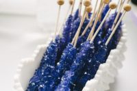 21 sugar rock candies in amethyst color are a great dessert idea for such a wedding