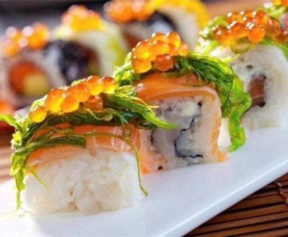 sushi topped with greenery and caviar is always a good idea whatever your wedding style and venue is