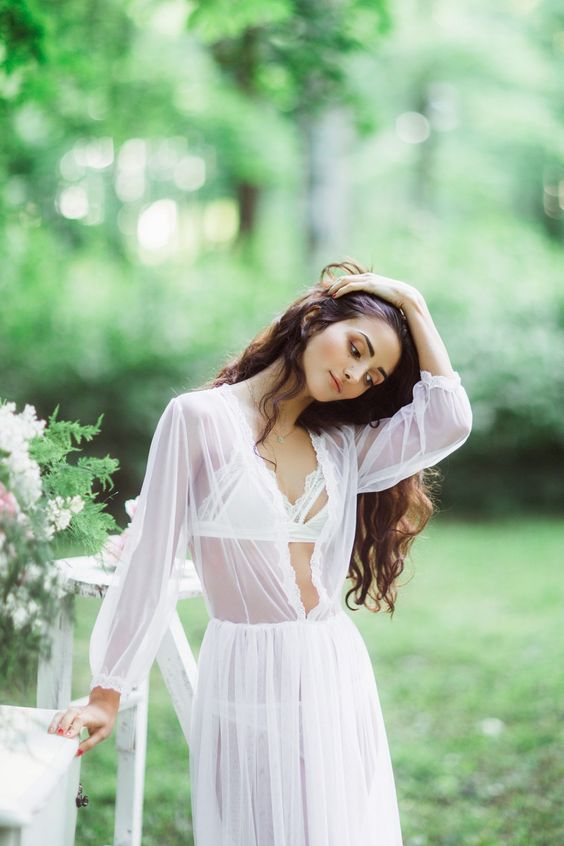 a sheer white long robe with long sleeves and a chic feminine bralette for a sexy look