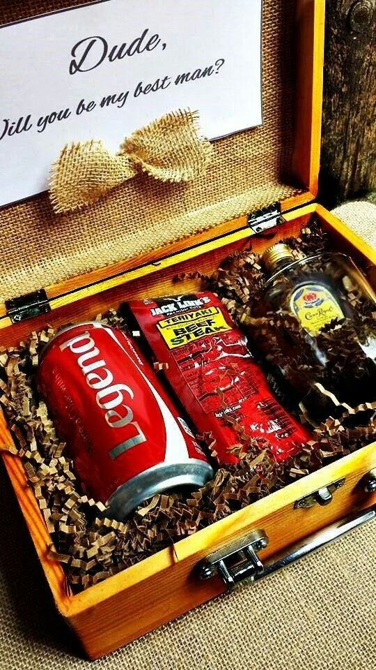 a rustic box with burlap, alcohol, coke, a beef steak piece for a rustic wedding