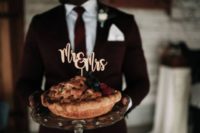 25 a wedding pie with berries and a cake topper instead of a usual wedding cake