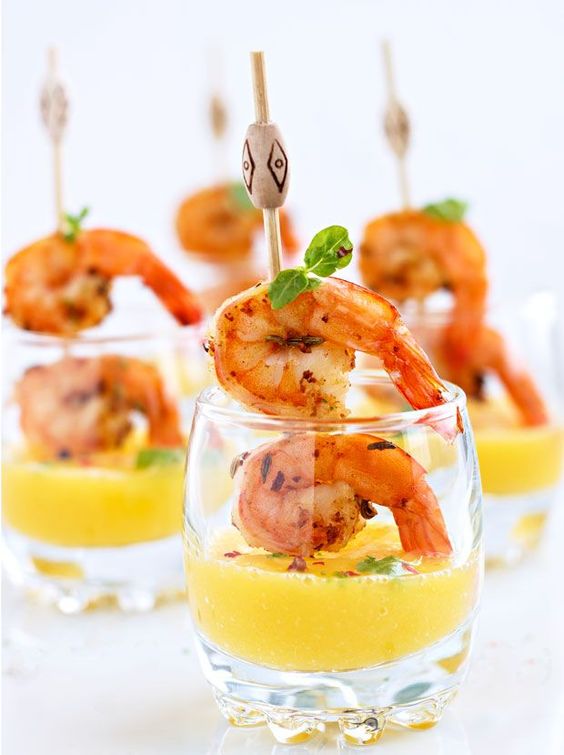 shrimp skewers with mango shooters are ideal for a tropical or beach wedding