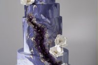 28 marbleized purple wedding cake with amethyst decor, gold leaf and some geode slices on top