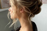 a dimensional and messy wavy updo with a bump on top and some waves down is a lovely idea for a wedding