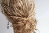 a low bun with straightened hair and locks down is an exquisite option to rock at a wedding