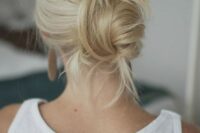 a messy twisted low bun will take just 1 minute to make