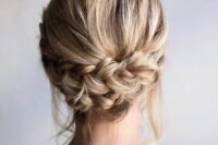 a lovely low bun hairstyle for a bridesmaid