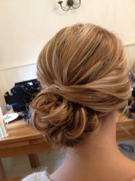 a simple and stylish wavy side updo with a volume on top always works, you may accent it with a hairpiece