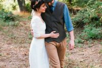 a vintage rustic groom’s look with a blue chambray shirt, brown trousers, shoes, a grey waistcoat, a grey cap