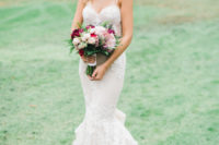 02 The bride chose a spaghetti strap wedding dress with lace appliques and a sweetheart neckline