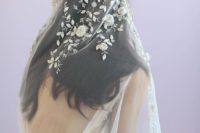 02 a gorgeous veil with realistic floral and leaf appliques of lace and beads for a romantic bride