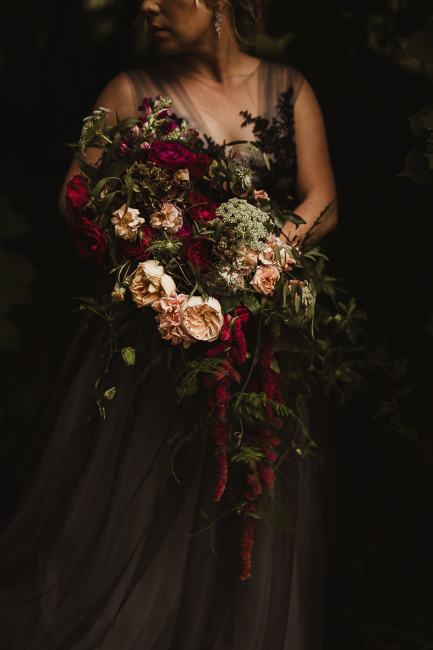 She carried a fantastic bouquet with fuchsia and blush touches