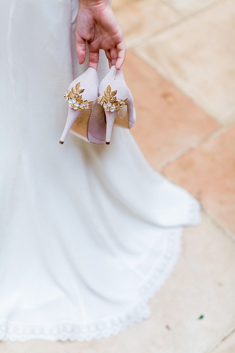 The blush shoes were also decorated with flowers