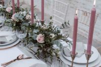 03 a stylish table setting with dusty pink candles, grey fabrics, eucalyptus and pink rose centerpieces