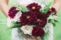 04 Her bouquet was done with creamy and deep burgundy blooms to highlight the jewel color scheme