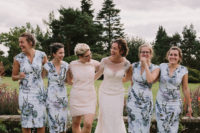 04 The bridesmaids were wearing midi floral dresses with V necklines
