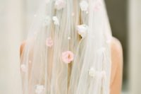 04 a veil with pearls and faux florals on the veil and its top looks veyr spring-like