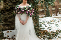 05 The bride was wearing an amazing off the shoulder gown, a braided updo and a killing fresh flower and greenery cape with tulle