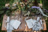 05 The wedding table was styled with modern sheer chargers with a metallic edge, silver flatware and lush greenery and blooms