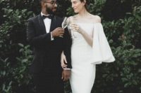 05 a minimalist wedding dress with off the shoulder bell sleeves to look wow