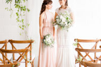 06 The bridesmaid was wearing a blush maxi dress with ruffles and a halter neckline