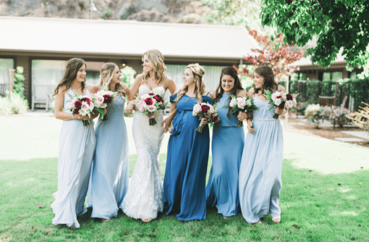 The bridesmaids opted for various shades of blue