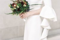 06 a modern off the shoulder sheath wedding dress with layered ruffled bell sleeves