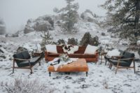 07 The wedding lounge was right in the snowy mountains, with leather furniture and faux animal skins