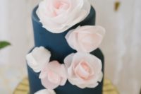 07 a navy wedding cake topped with pink flowers is an ideal match for this color scheme