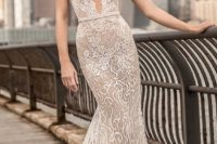 08 a mermaid spaghetti strap wedding dress with a plunging neckline, embellishments and an open back by Berta Bridals