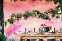 09 a bold watercolor backdrop in pink, coral and yellow plus natural greenery and blooms