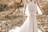 09 a gorgeous mermaid wedding dress with a plunging neckline, a train, bell sleeves and embroidery