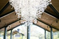 09 a stunning paper crane chandelier for decorating a wedding venue