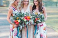09 wide strap maxi dresses with a V-neckline and watercolor floral prints for a bold wedding