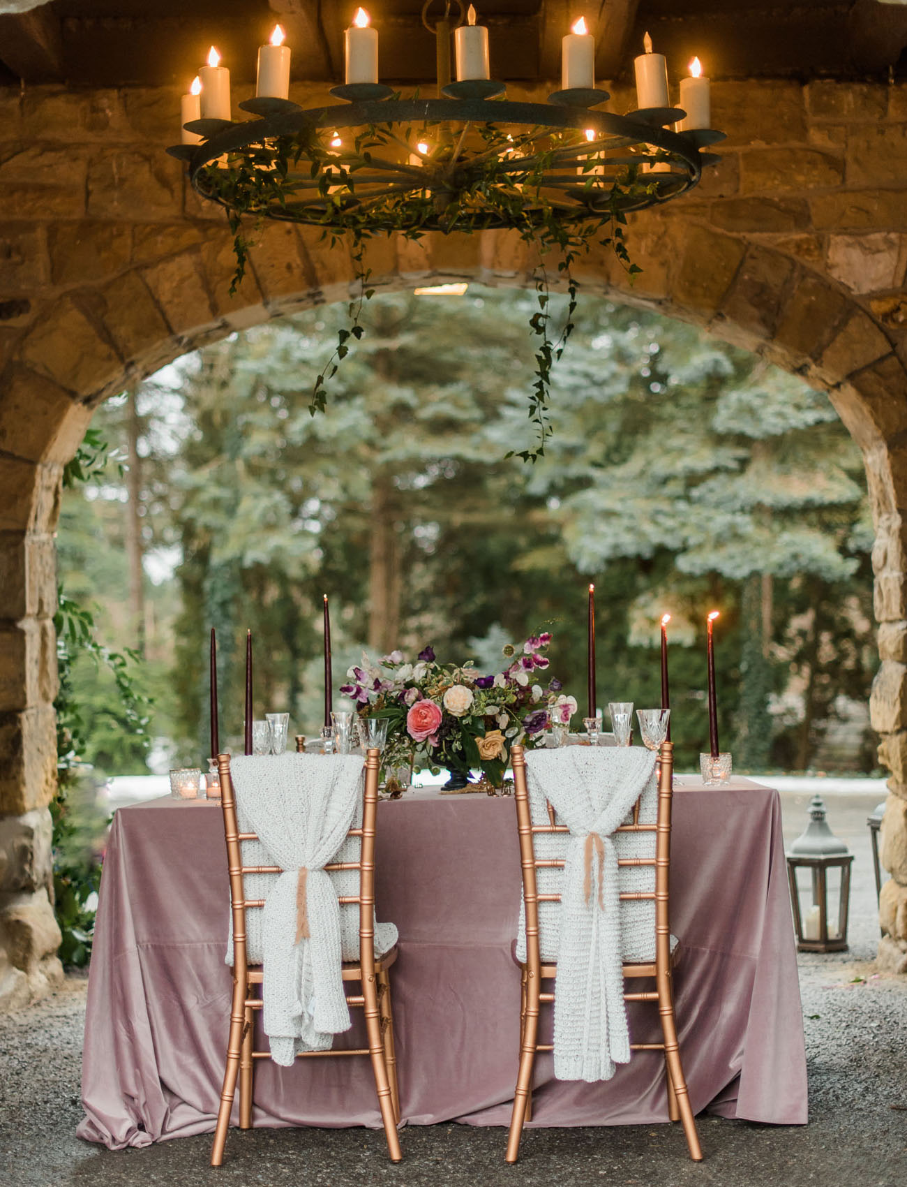 The dreamy reception was lit up with a chandelier and looked truly romantic