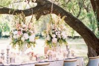 12 a pastel table setting in the shades of blush and powder blue chairs