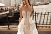 12 a strapless plunging neckline sheath wedding dress with an overskirt and lace appliques by Berta
