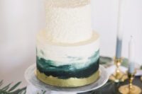 12 a wedding cake with a textural top tier and a watercolor one in gold, dark green and emerald