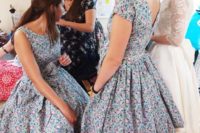 12 tea-length blue and pink retro-inspired bridesmaids’ dresses with a bateau neckline and a full skirt