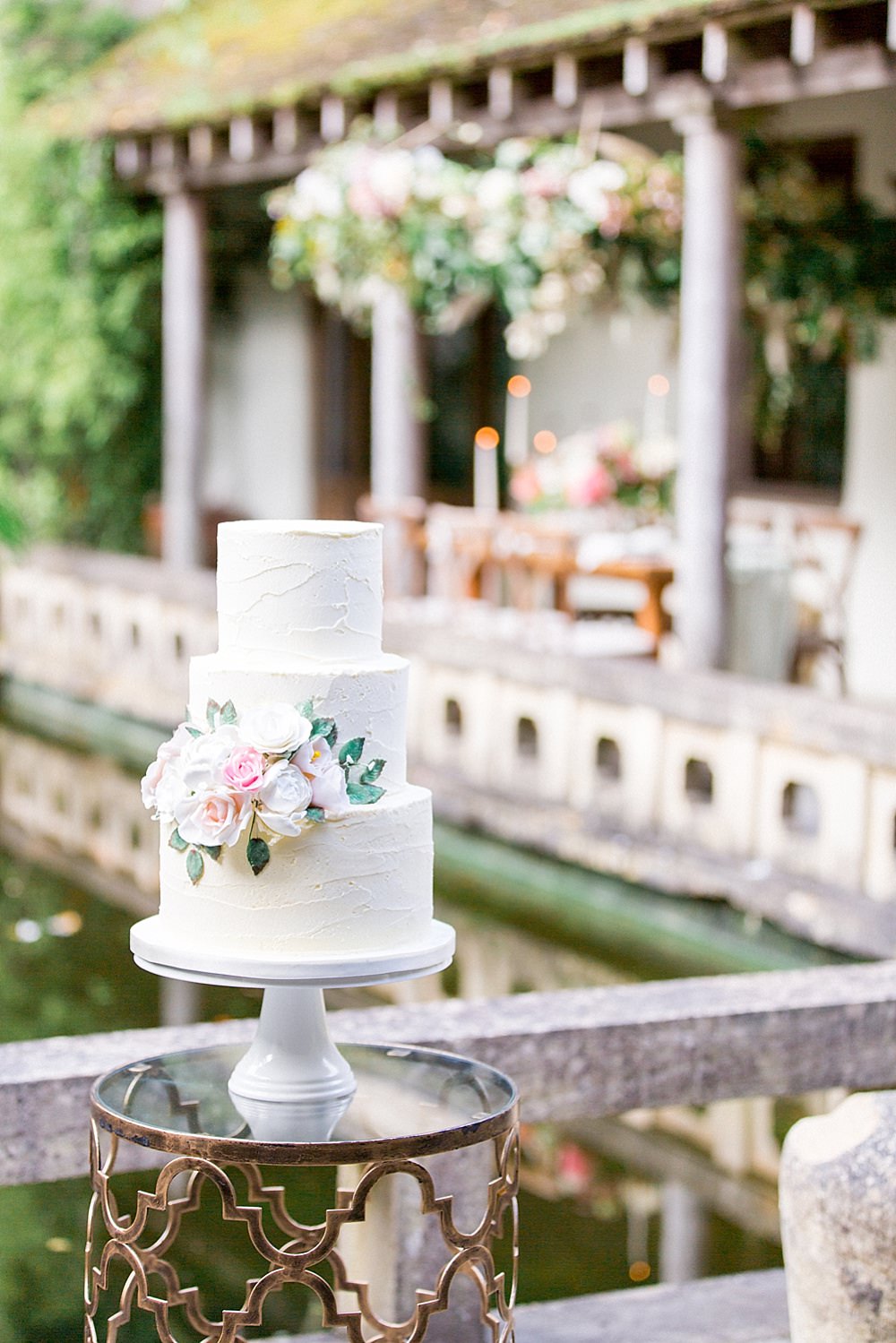 The wedding cake was a textural one, with lush blooms and greenery to fit the shoot theme